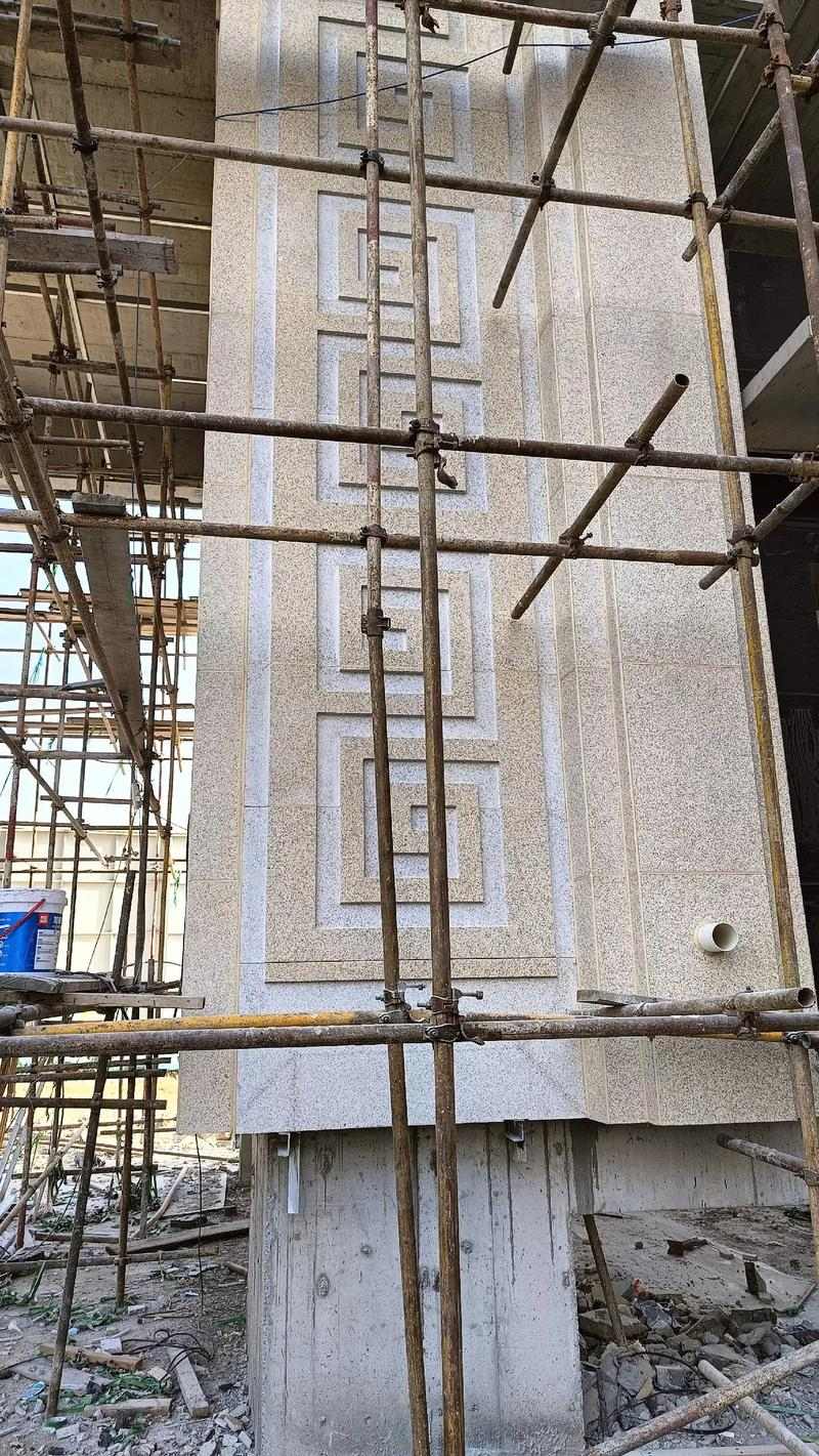 吴忠 黄金麻花岗岩别墅外墙干挂回纹造型效果