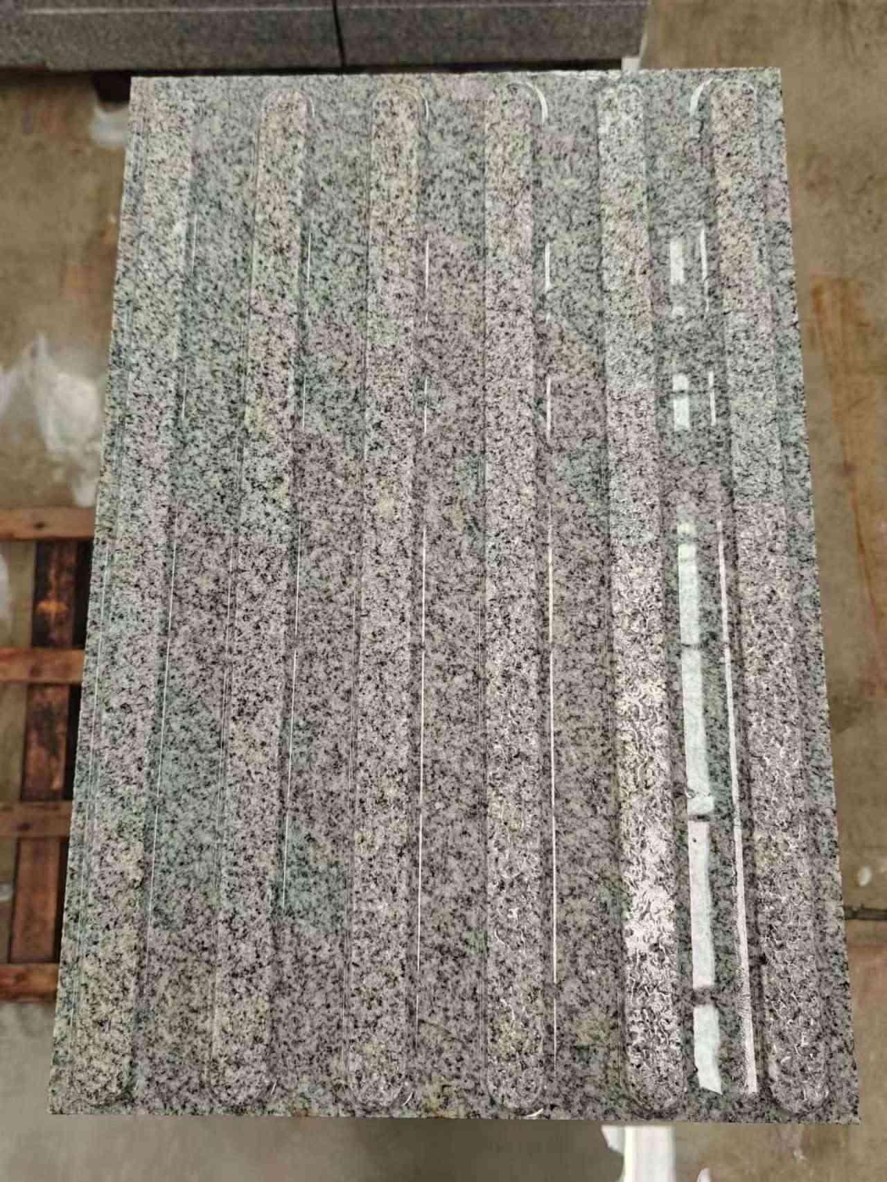 吴忠 芝麻白花岗岩荔枝面雕刻盲道，盲条